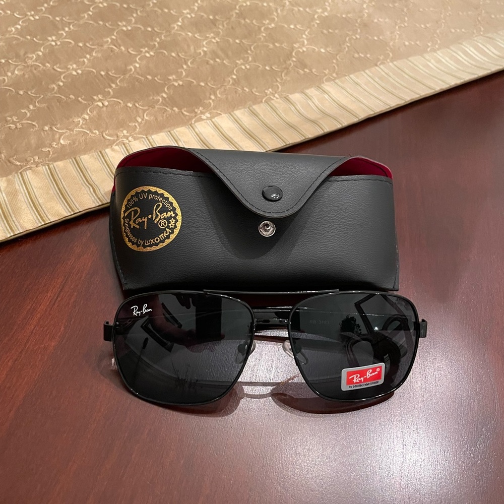 Ray Ban 3483 polarized gun metal sunglasses. Never been worn.